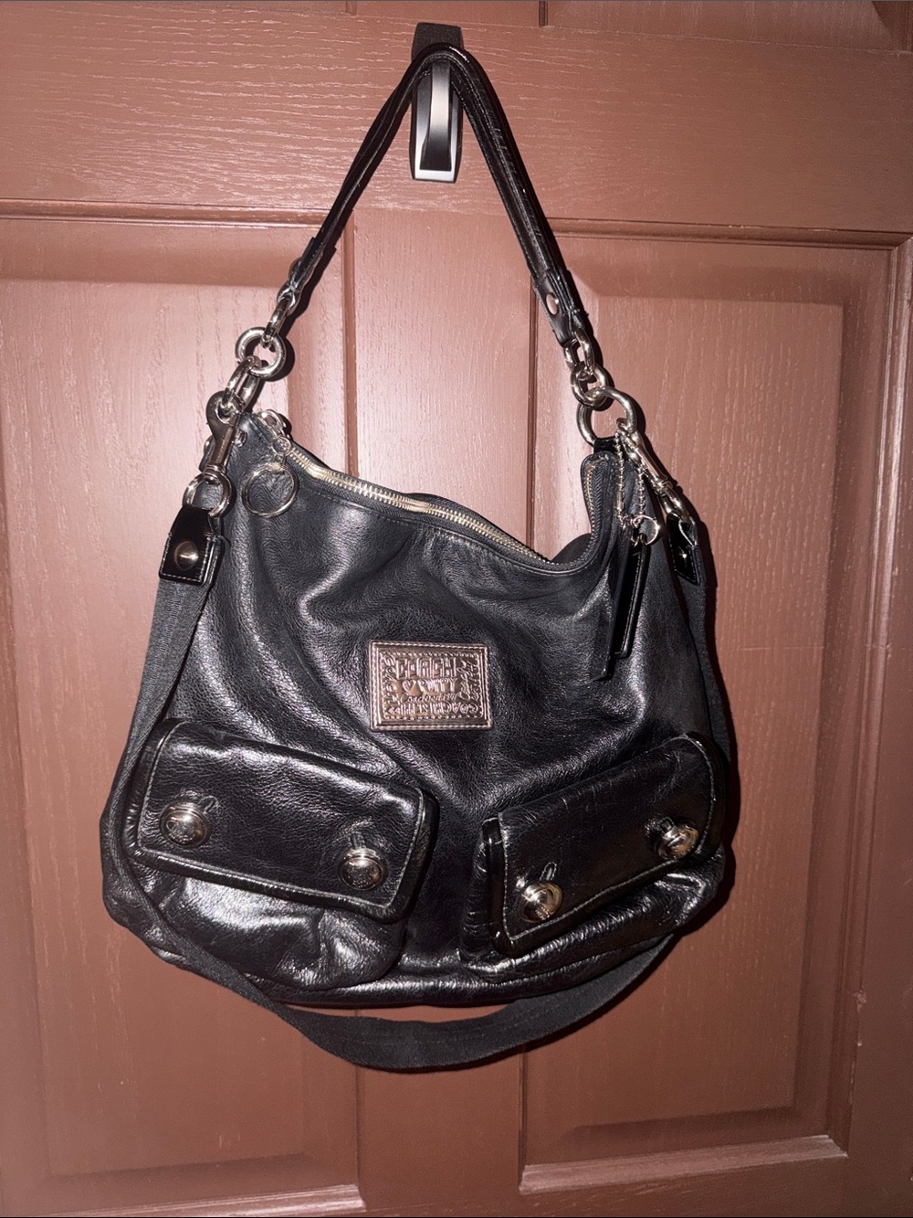 Coach Poppy in shimmery black